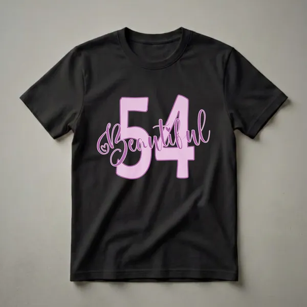 Light pink graphic t-shirt featuring the number 54 with the word 'Beautiful' in purple script font and small heart accents.