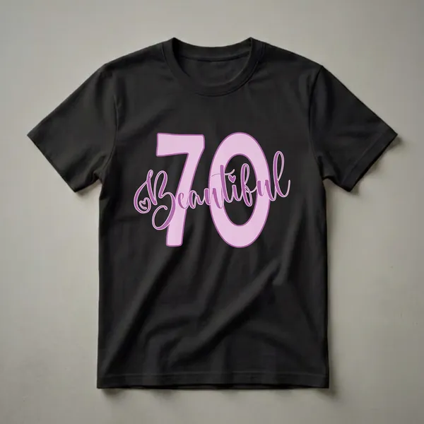 Light pink graphic t-shirt with the number 70 and the word 'Beautiful' in purple script, featuring small heart details.