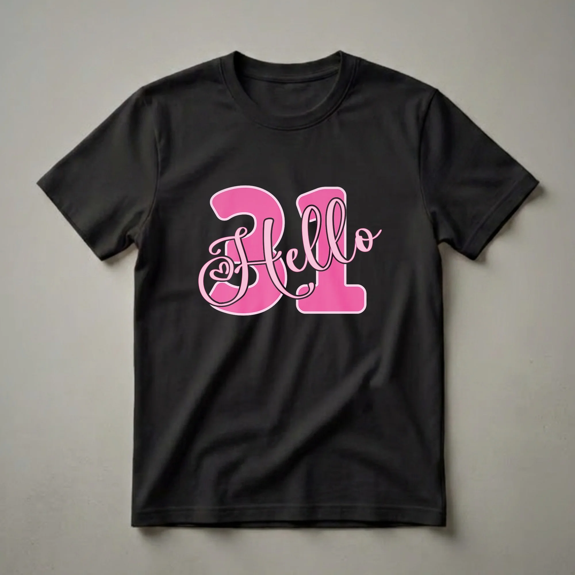 Pink graphic t-shirt with bold pink numbers '31' and the word 'Hello' in a script font, featuring a small heart detail.