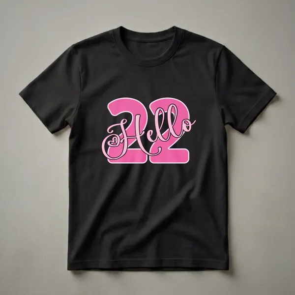 Black t-shirt with a graphic design featuring the number 22 in bright pink with a darker pink outline, and the word 'Hello' in a pink script font.