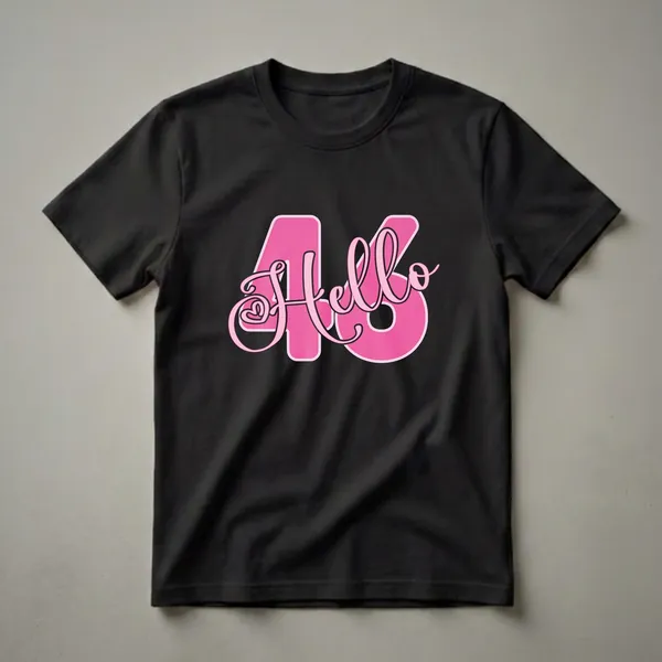 Pink graphic t-shirt with the number 46 and the word 'Hello' in a script font, designed for a 46th birthday celebration.