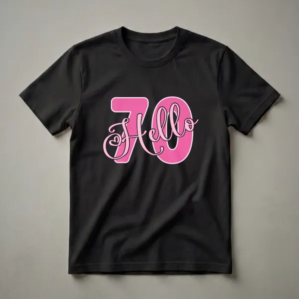 Pink 'Hello 70' graphic t-shirt with a black outline and a small heart detail, designed for women celebrating their 70th birthday.