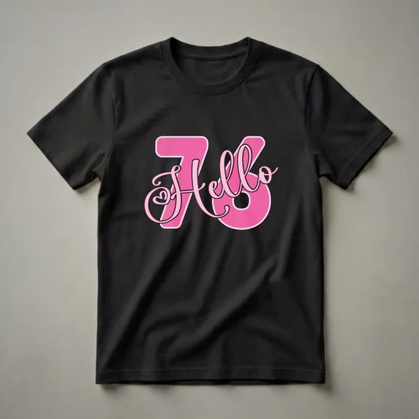 Black t-shirt with a graphic design featuring the number 76 in bold pink with a pink script 'Hello' overlay and a small heart detail.