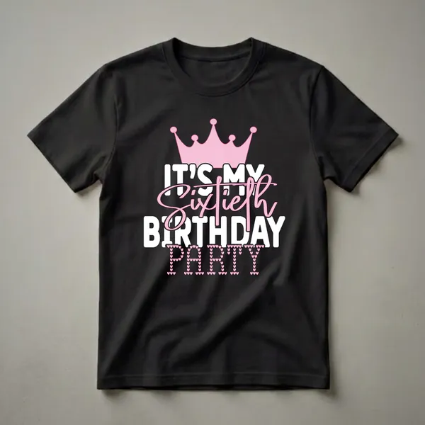 Black t-shirt with a pink crown graphic and white text that reads 'IT'S MY SIXTIES BIRTHDAY PARTY', with the word 'PARTY' formed by small pink hearts.