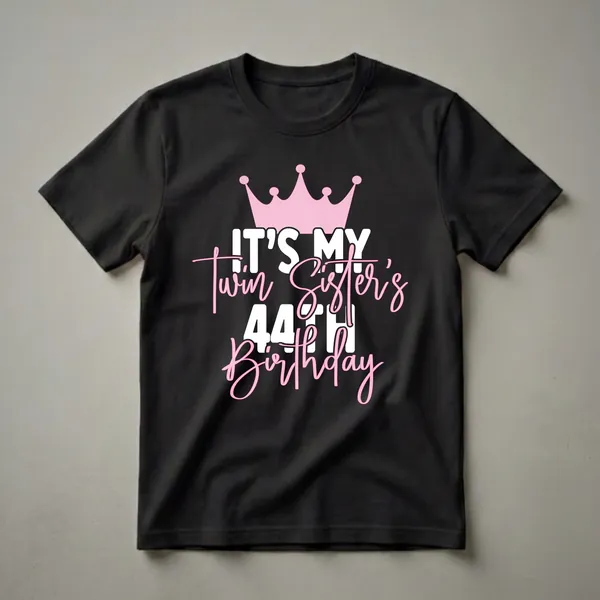 Black t-shirt with a pink crown graphic and white and pink text that reads 'IT'S MY Twin Sister's 44TH Birthday'.
