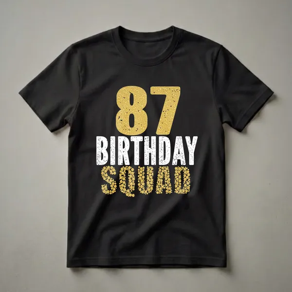 Black t-shirt with white distressed text reading "BIRTHDAY" and gold textured text reading "87" and "SQUAD".