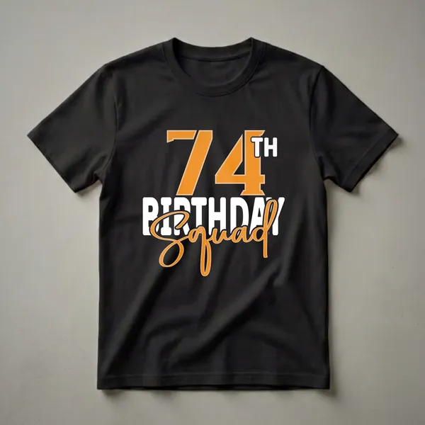 Black t-shirt with orange and white text that reads '74th BIRTHDAY Squad' in a bold, celebratory graphic design.
