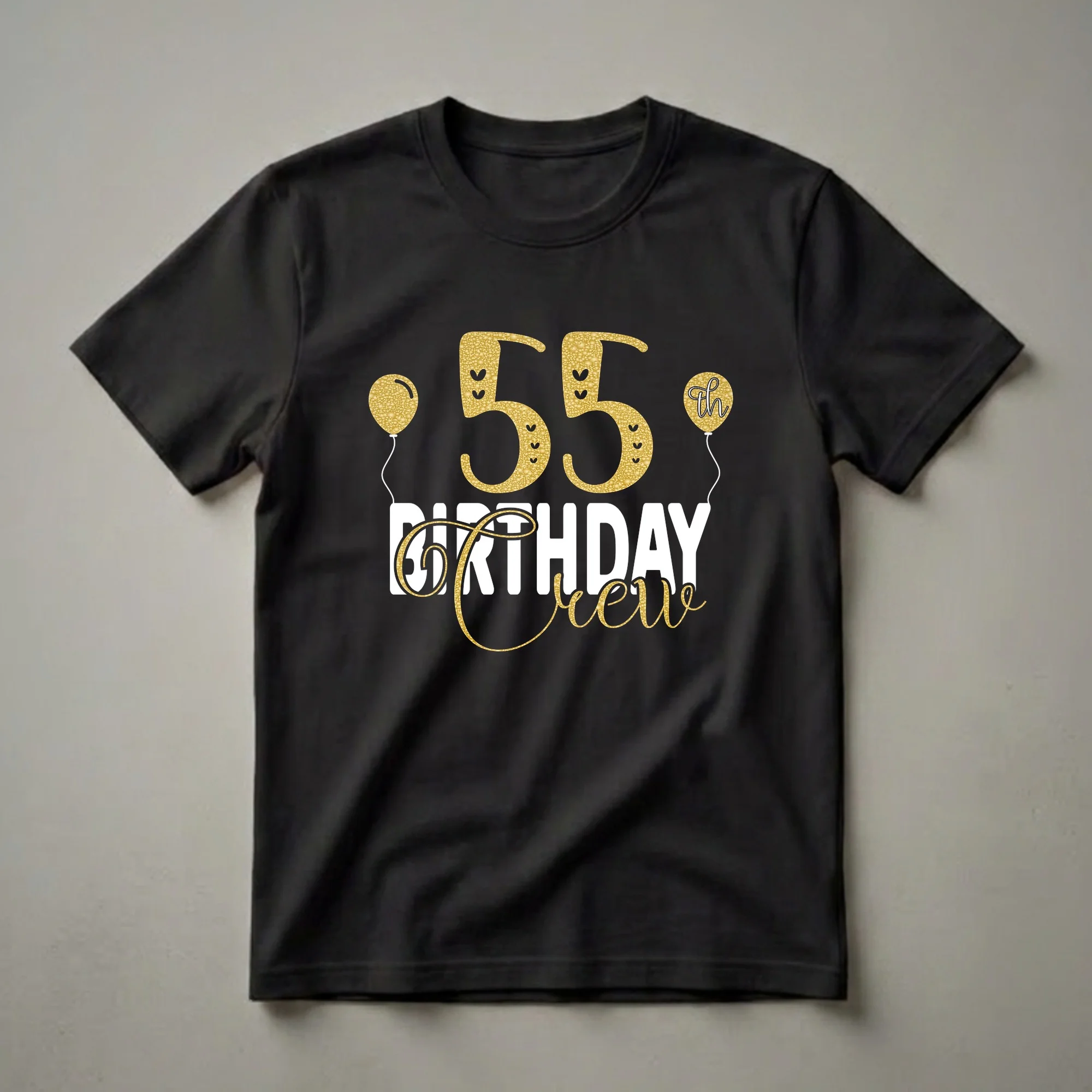Black t-shirt with gold textured '55' and 'th' numbers, white 'BIRTHDAY' text, and gold script 'CREW' text, with two gold balloons on the sides.
