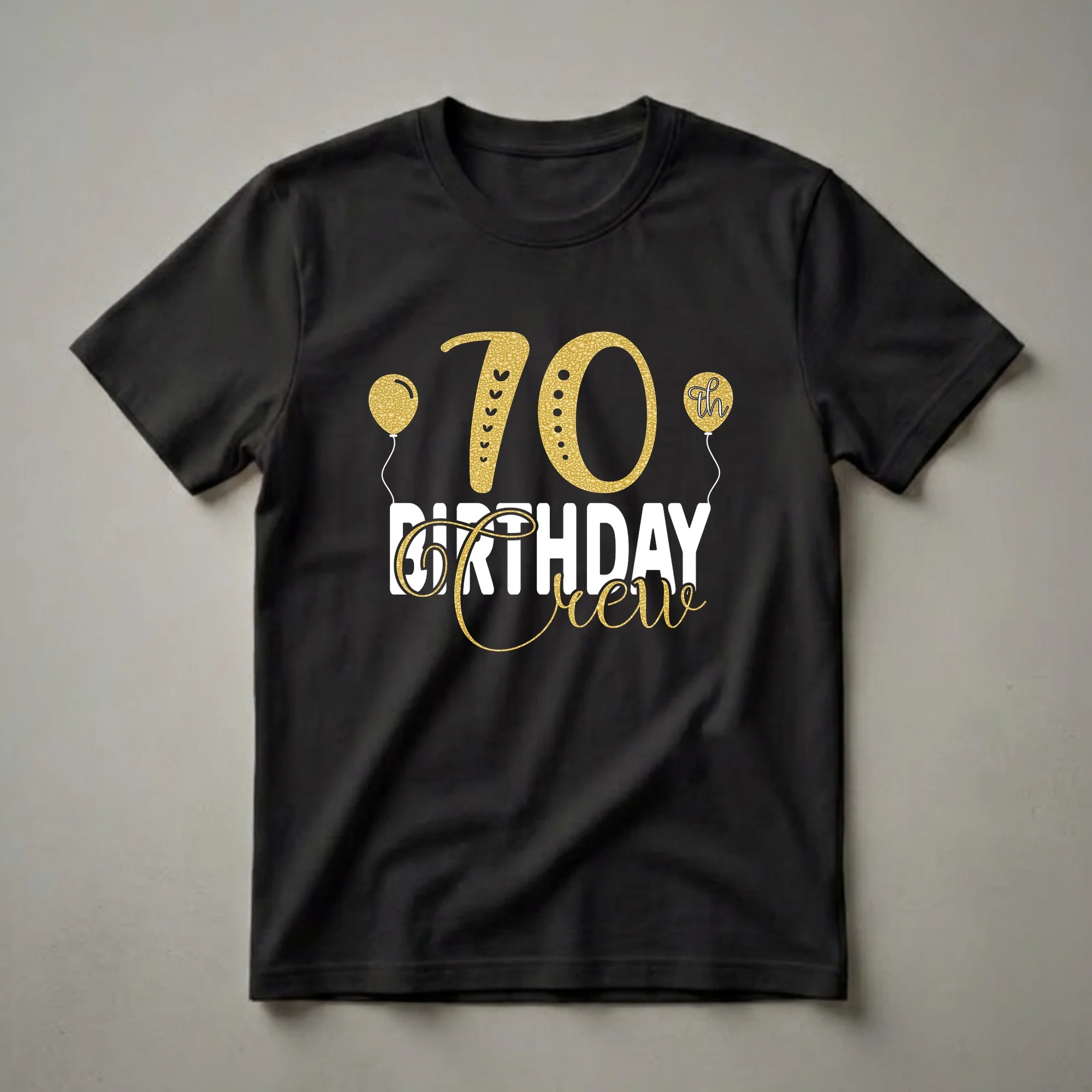 Black t-shirt with gold and white text that reads '70th Birthday Crew' with two gold balloons.