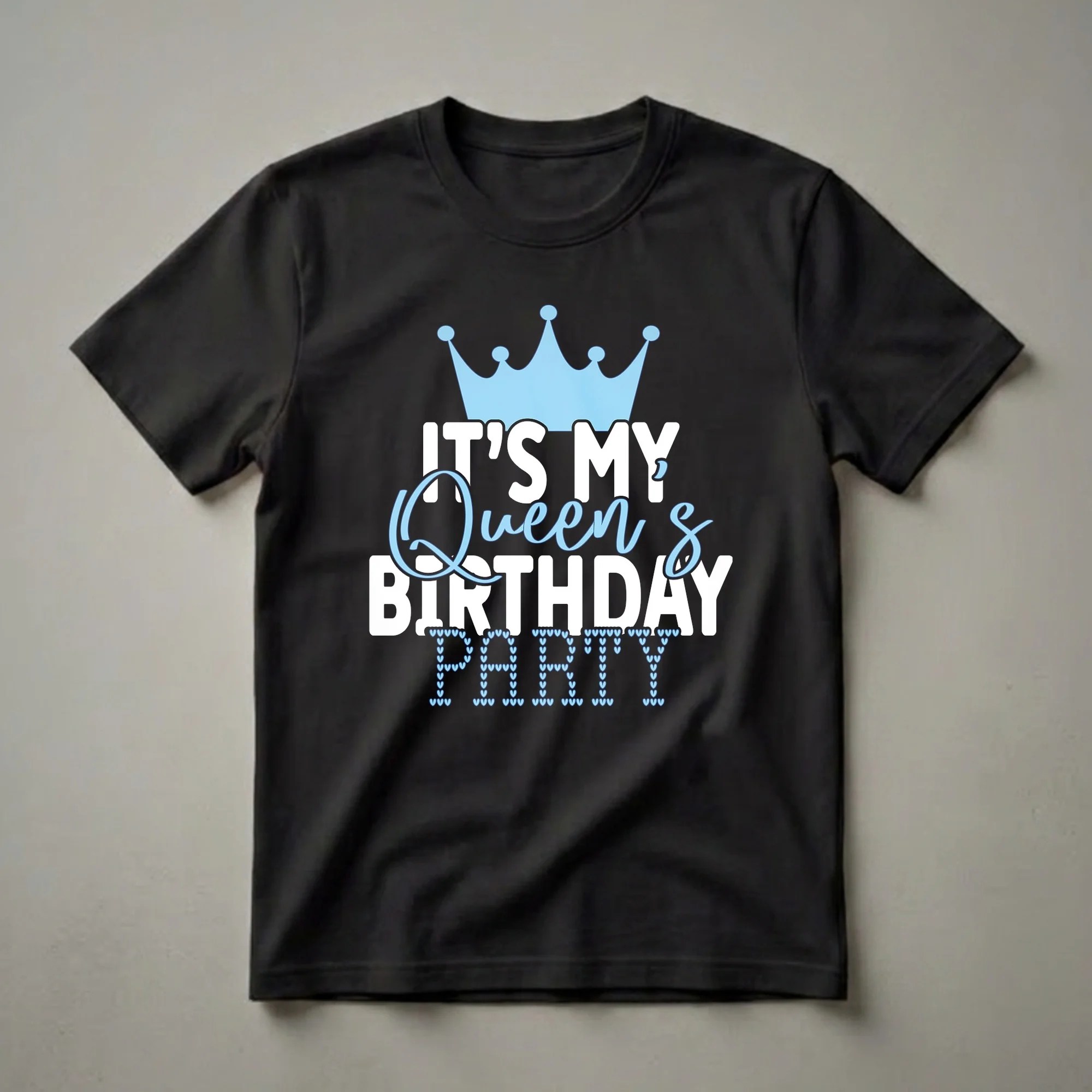 Black t-shirt with white and light blue text that reads 'IT'S MY Queen's BIRTHDAY PARTY', featuring a light blue crown and the word 'PARTY' made of small blue hearts.