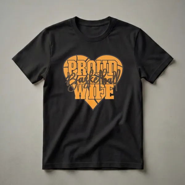 Orange heart graphic with basketball texture and black outline, featuring bold orange text that reads 'PROUD BASKETBALL WIFE' in mixed fonts, on a black t-shirt.