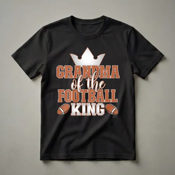 Black t-shirt with orange and white text reading 'Grandma of the Football King' and two football graphics.