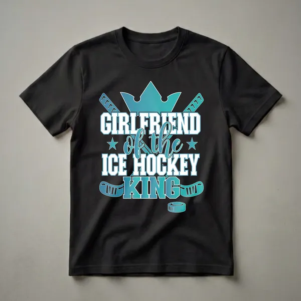 Black t-shirt with teal and white graphic text that reads 'Girlfriend of the Ice Hockey King', featuring hockey sticks, a crown, and a puck.