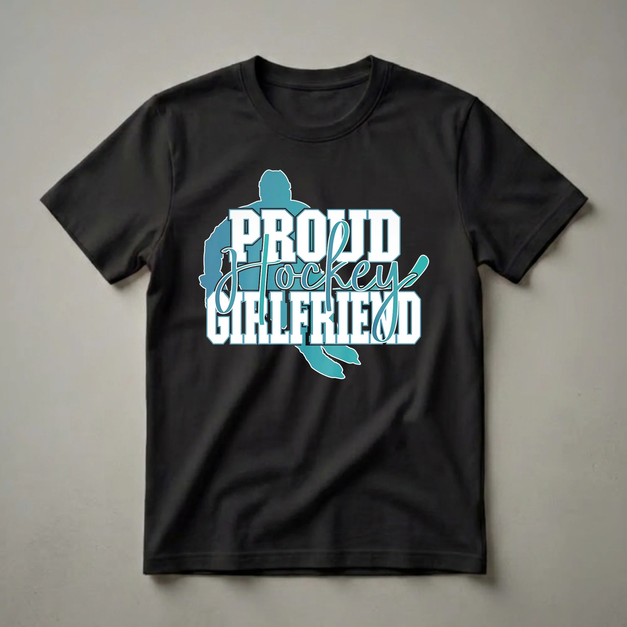 White and teal graphic t-shirt with the words 'Proud Hockey Girlfriend' and a silhouette of a hockey player.