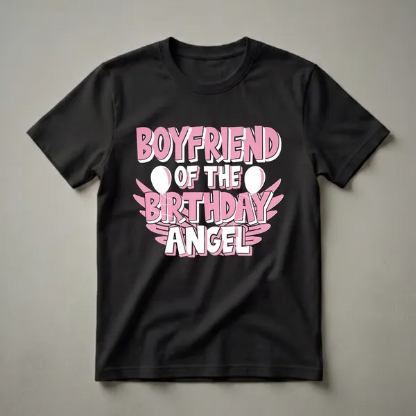 Black t-shirt with pink and white text reading 'Boyfriend Of The Birthday Angel', accented by pink wings and white balloons.