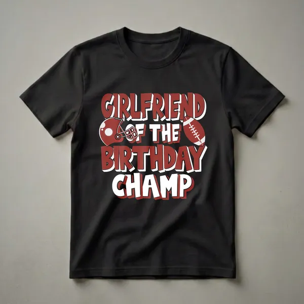 Red and white graphic t-shirt with bold text 'Girlfriend of the Birthday Champ' and American football helmet and ball graphics.