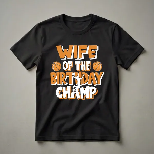 Black t-shirt with bold orange and white text reading 'WIFE OF THE BIRTHDAY CHAMP', featuring two basketballs and a silhouette of a basketball player mid-jump.