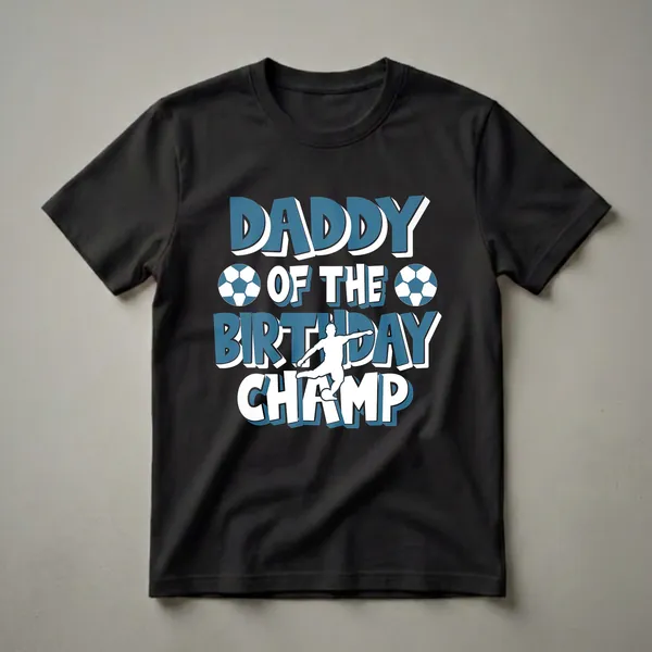 Black t-shirt with blue and white text reading 'Daddy Of The Birthday Champ', featuring two soccer balls and a white silhouette of a soccer player kicking a ball.