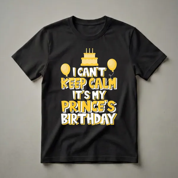 Black t-shirt with yellow and white text that reads 'I Can't Keep Calm It's My Prince's Birthday', featuring a yellow birthday cake with candles and two yellow balloons.