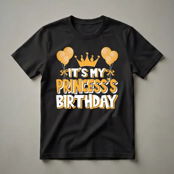 Black t-shirt with orange and white text that reads 'IT'S MY PRINCESS'S BIRTHDAY', topped with a golden crown and flanked by orange balloons.