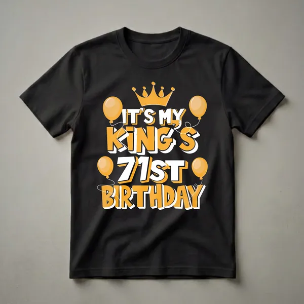 Black t-shirt with orange and white text that reads 'IT'S MY KING'S 71ST BIRTHDAY', featuring a golden crown and orange balloons.