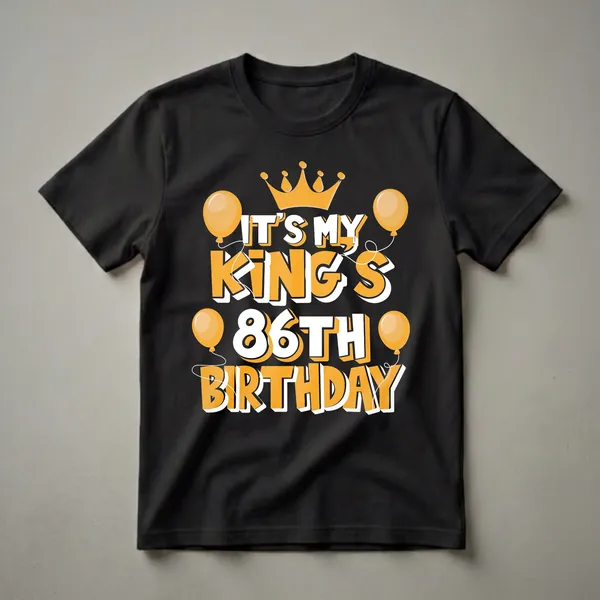 Black t-shirt with orange and white text reading 'IT'S MY KING'S 86TH BIRTHDAY', a golden crown, and orange balloons.