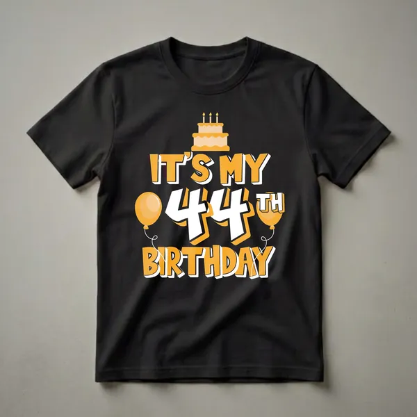 Black t-shirt with orange and white text that reads 'IT'S MY 44TH BIRTHDAY', featuring a birthday cake and two balloons.