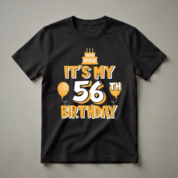 Black t-shirt with orange and white graphic text reading 'IT'S MY 56TH BIRTHDAY', a cartoon birthday cake with candles, and two orange balloons.