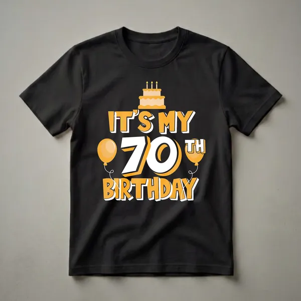 Black t-shirt with orange and white graphic that reads 'IT'S MY 70TH BIRTHDAY' with a cake and balloons.