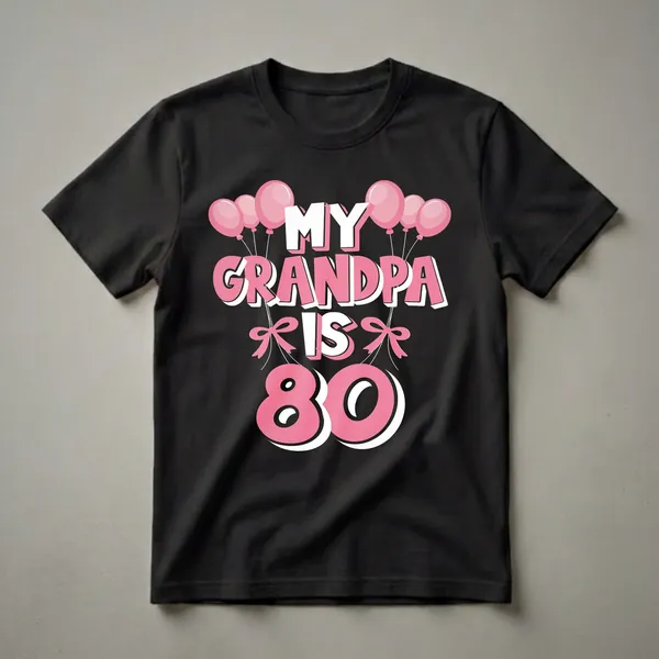 Black t-shirt with pink and white graphic text that reads "MY GRANDPA IS 80" surrounded by pink balloons and bows.