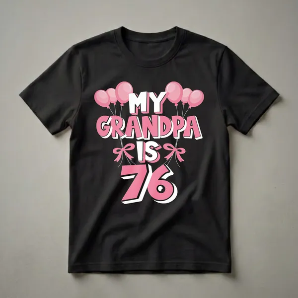 Black t-shirt with pink and white text that reads 'MY GRANDPA IS 76' surrounded by pink balloons and pink bows.