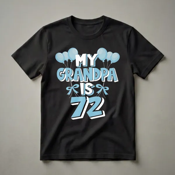 Black t-shirt with light blue and white text that reads "MY GRANDPA IS 72" surrounded by light blue balloons and bows.