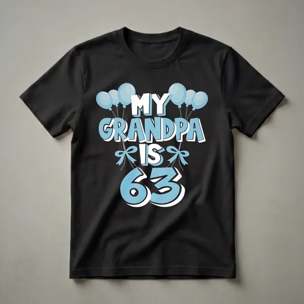 Black t-shirt with light blue and white text that reads 'MY GRANDPA IS 63' surrounded by light blue balloons and bows.
