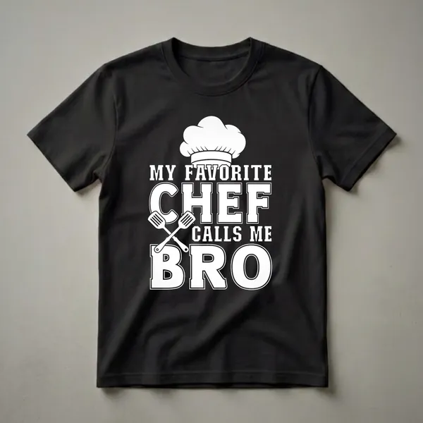 Black t-shirt with white graphic text that reads 'My Favorite Chef Calls Me Bro' and features a chef's hat and crossed spatulas.