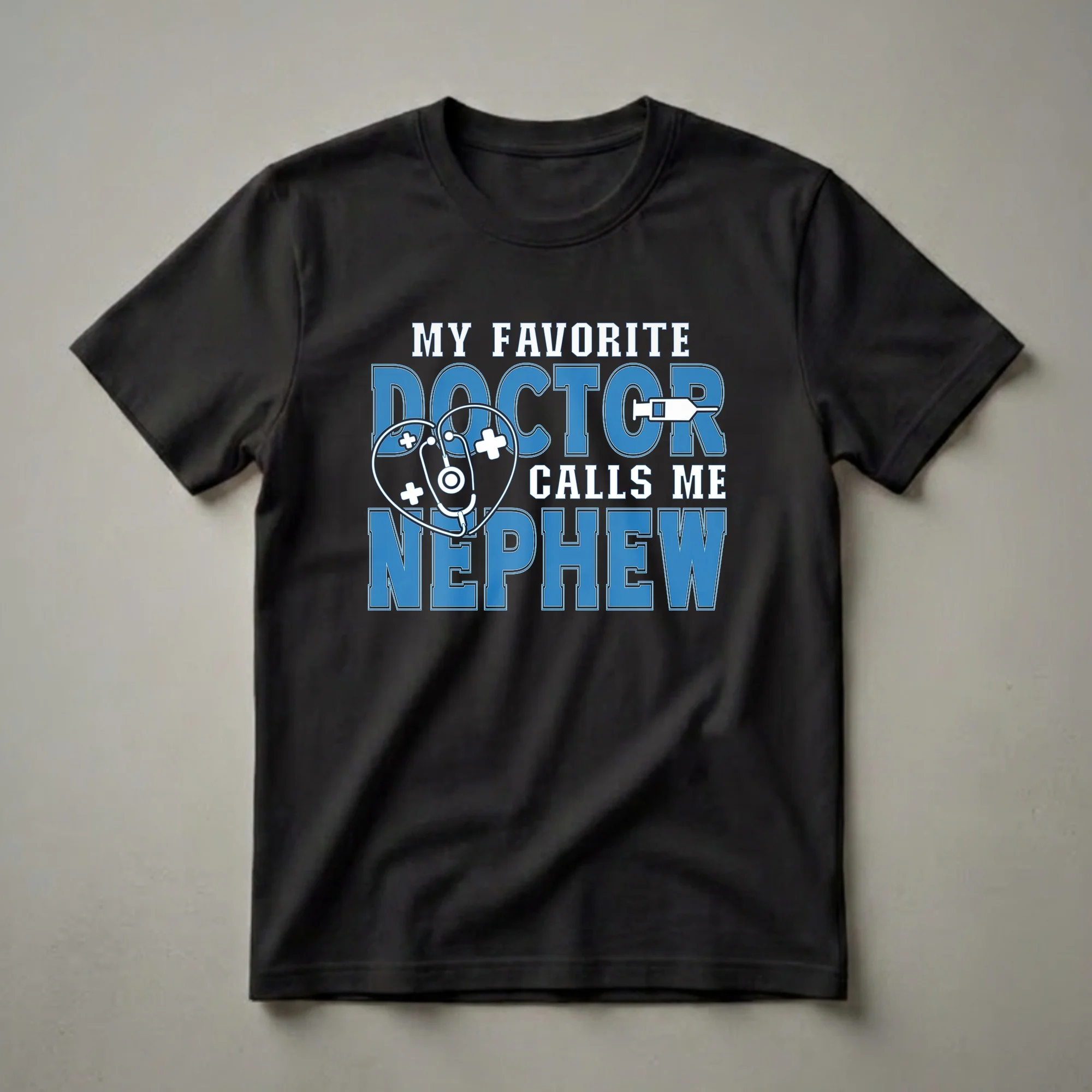 Black t-shirt with blue and white text that reads "MY FAVORITE DOCTOR CALLS ME NEPHEW" with medical symbols including a stethoscope and syringe.