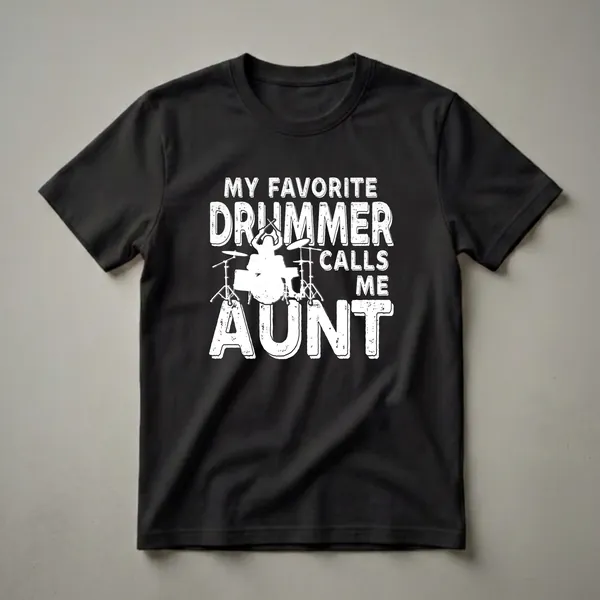 White distressed text reading 'My Favorite Drummer Calls Me Aunt' with a silhouette of a drummer and drum kit on a black t-shirt.
