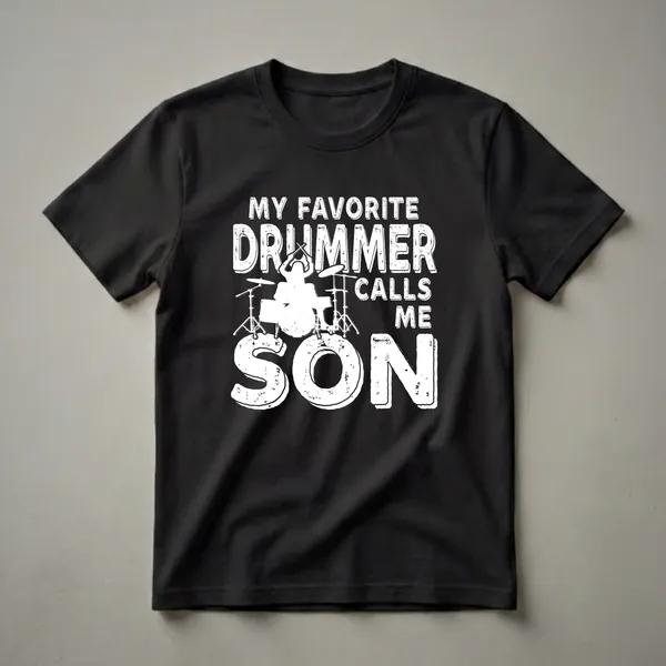 Black t-shirt with white distressed text that reads 'MY FAVORITE DRUMMER CALLS ME SON' and a silhouette of a drummer playing a drum kit.