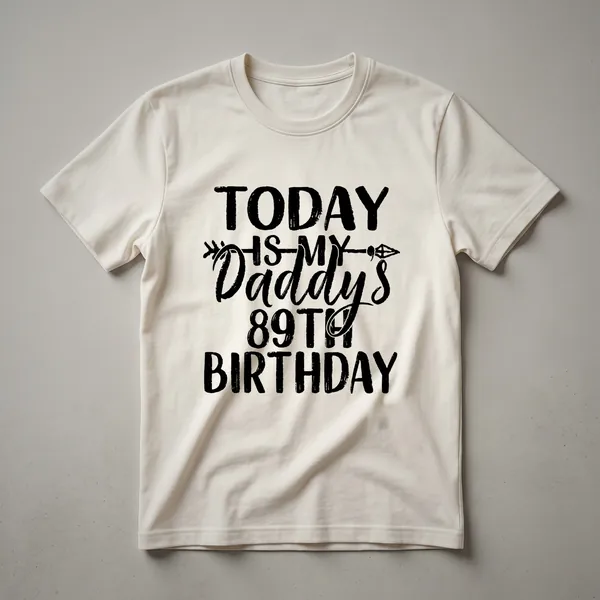 Black t-shirt with distressed graphic text reading '89' and 'Daddy's Birthday' in a vintage style.