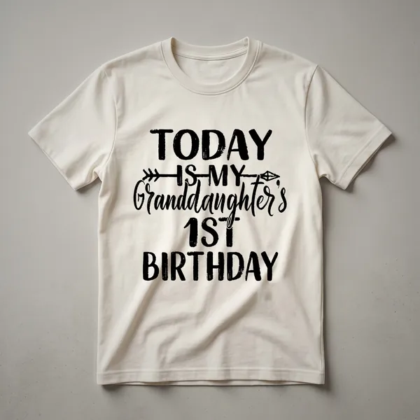 White t-shirt with a pink and gold '1' graphic, surrounded by floral elements and the text 'My Granddaughter Is Turning One', suitable for a first birthday party.