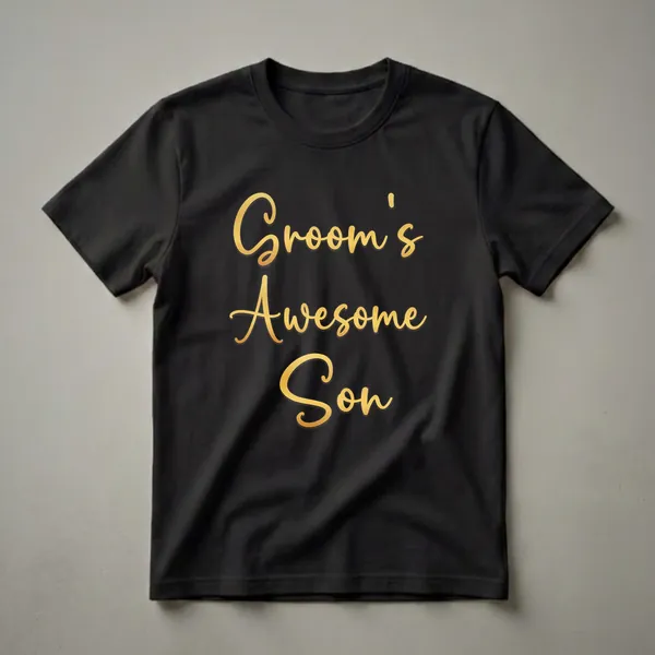 Black t-shirt with elegant gold script text that reads 'Groom's Son', perfect for wedding celebrations.