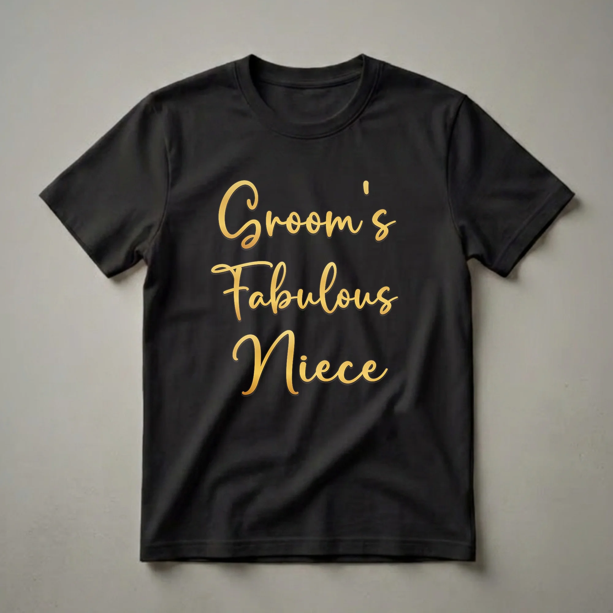 Black t-shirt with the words 'Groom's Fabulous Niece' printed in elegant, shimmering gold script font.