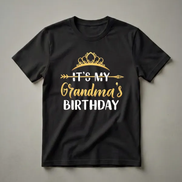 Black t-shirt with gold and white text that reads 'IT'S MY GRANDMA'S BIRTHDAY' with a gold crown and arrow graphic.