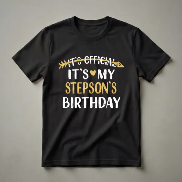 Black t-shirt with distressed white and gold text that reads 'It's Official It's My Stepson's Birthday', featuring a gold arrow and heart graphic.