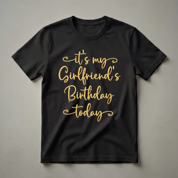 Black t-shirt with gold script text that reads 'it's my Girlfriend's Birthday today'.