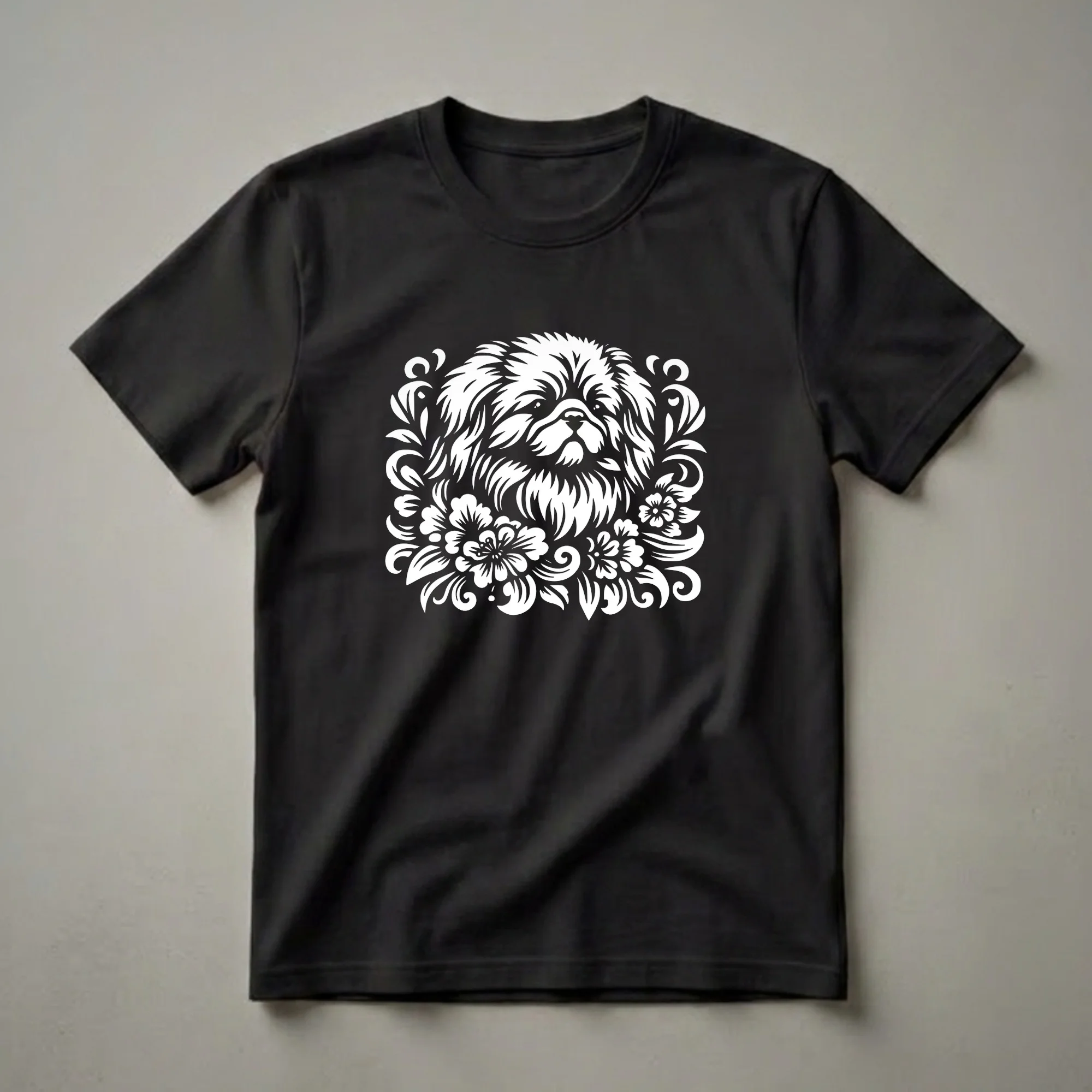 White graphic of a Pekingese dog's face framed by flowers and leaves on a black t-shirt.