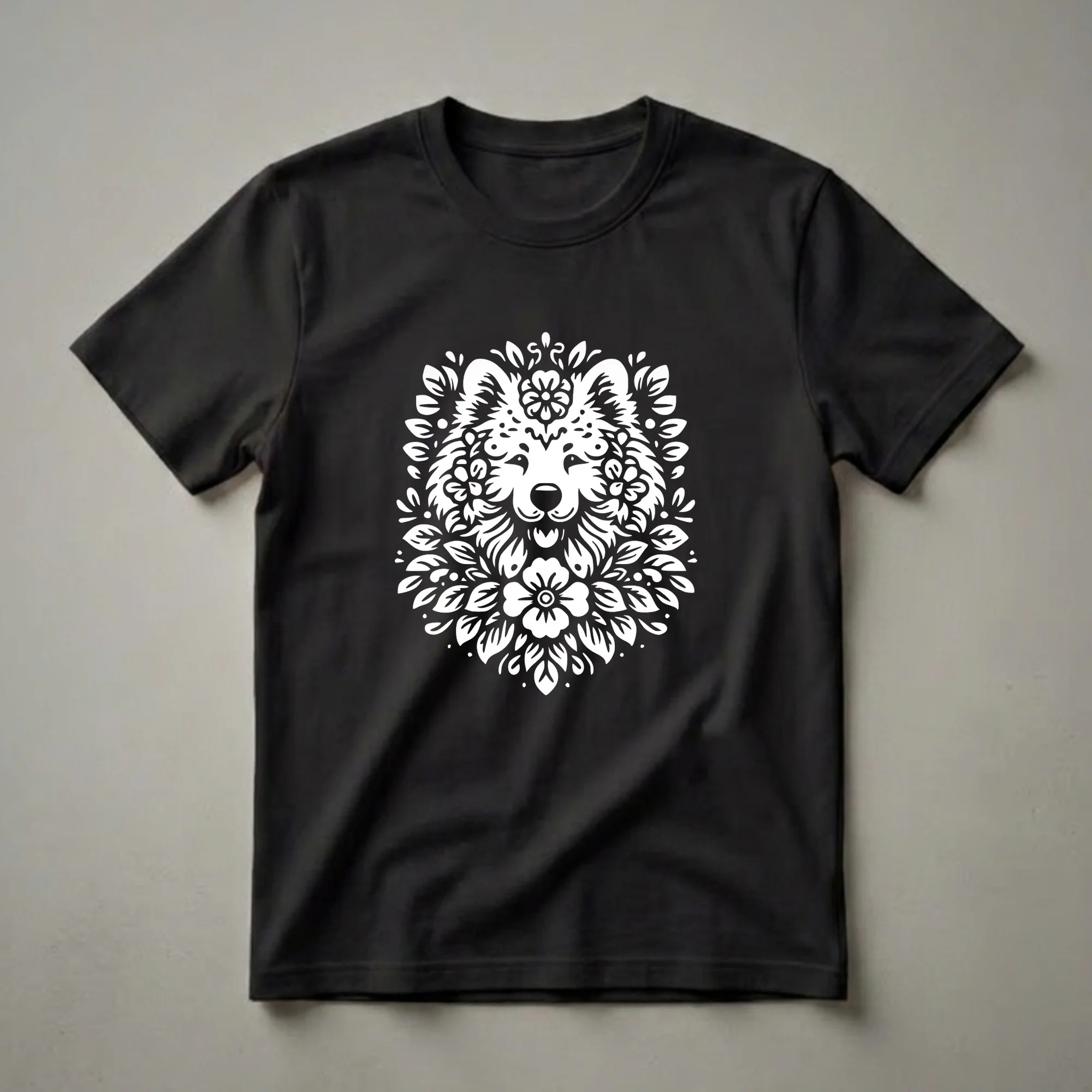 White floral graphic of a Samoyed dog's face surrounded by flowers and leaves on a black t-shirt.