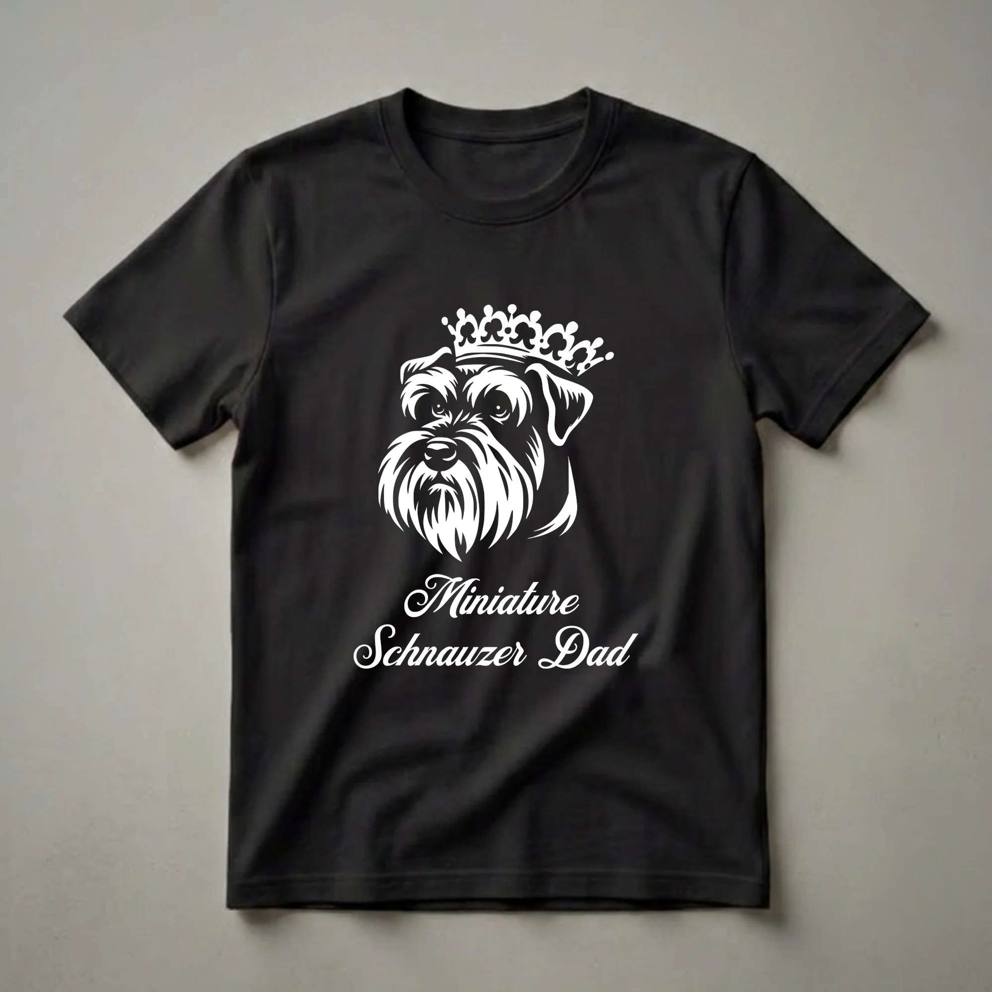 White graphic of a Miniature Schnauzer's head wearing a crown, with the words 'Miniature Schnauzer Dad' below, on a black t-shirt.