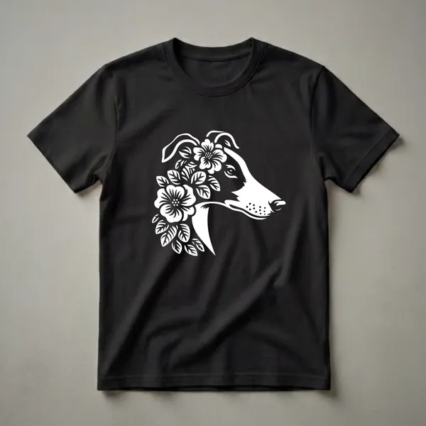 White graphic of a whippet's head with flowers and leaves on a black t-shirt, showcasing the breed's profile and floral adornments.