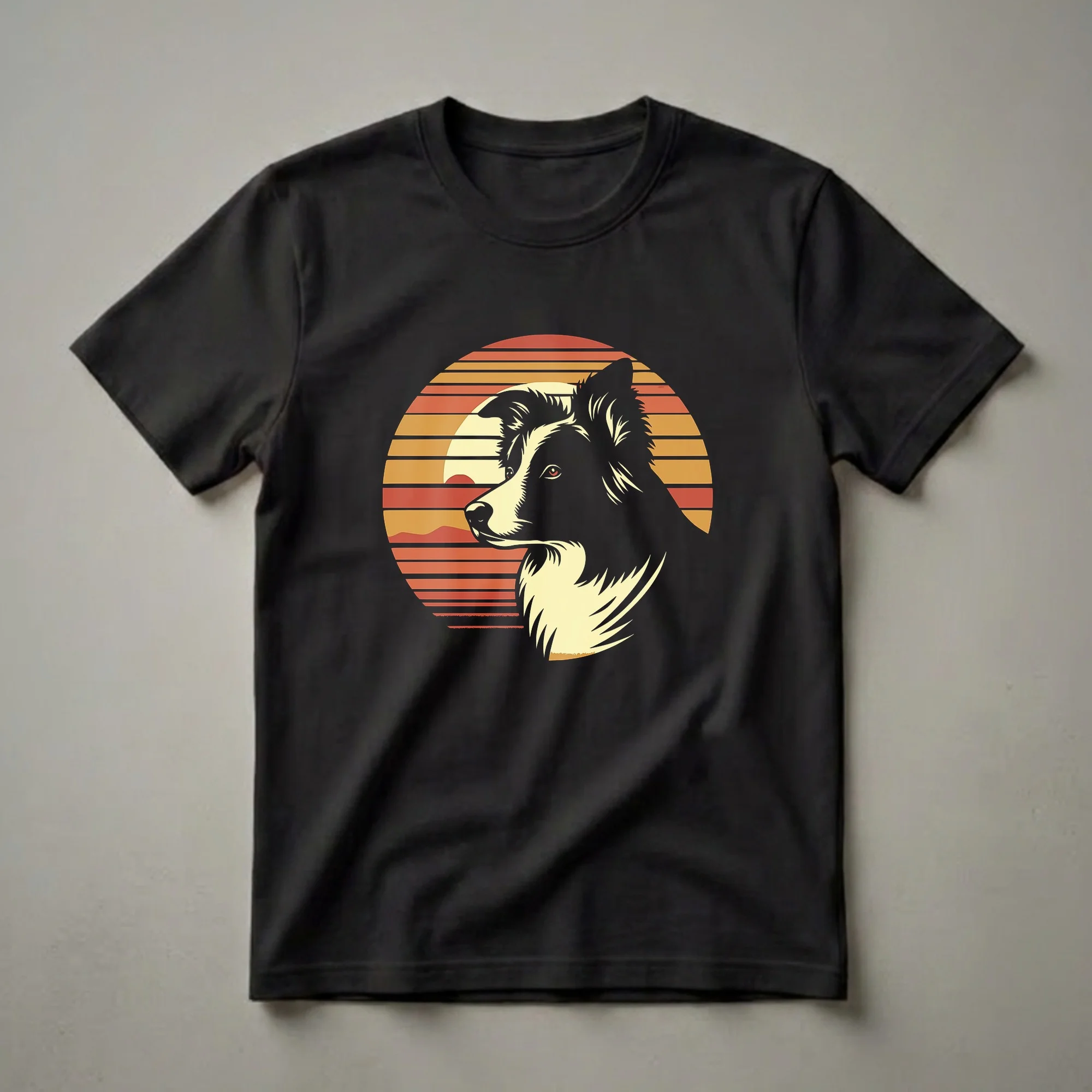 A graphic t-shirt featuring a white and black Border Collie's head in profile against a retro sunset with orange, yellow, and red horizontal stripes.
