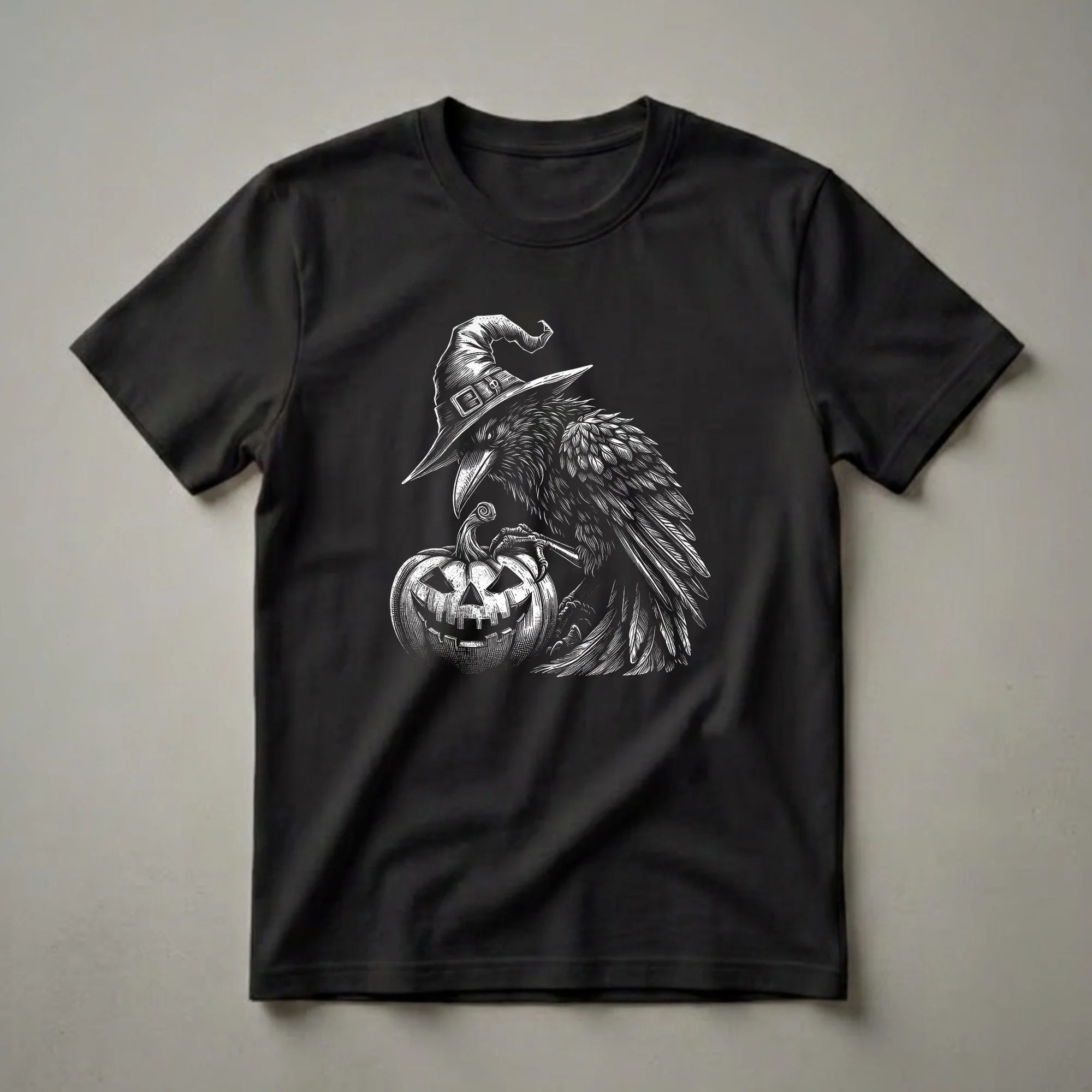 Black and white linocut t-shirt design featuring a raven wearing a witch hat and perched next to a carved jack-o'-lantern.